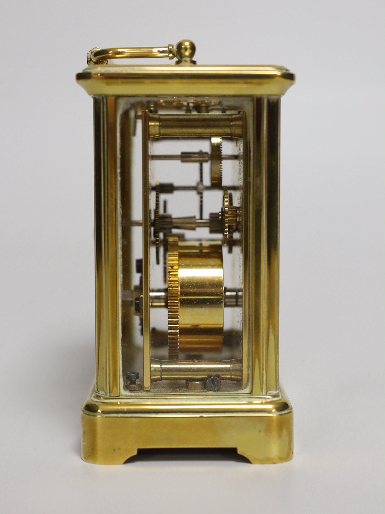 A brass eight day carriage timepiece, retailed by Comitti of London, 12cm high